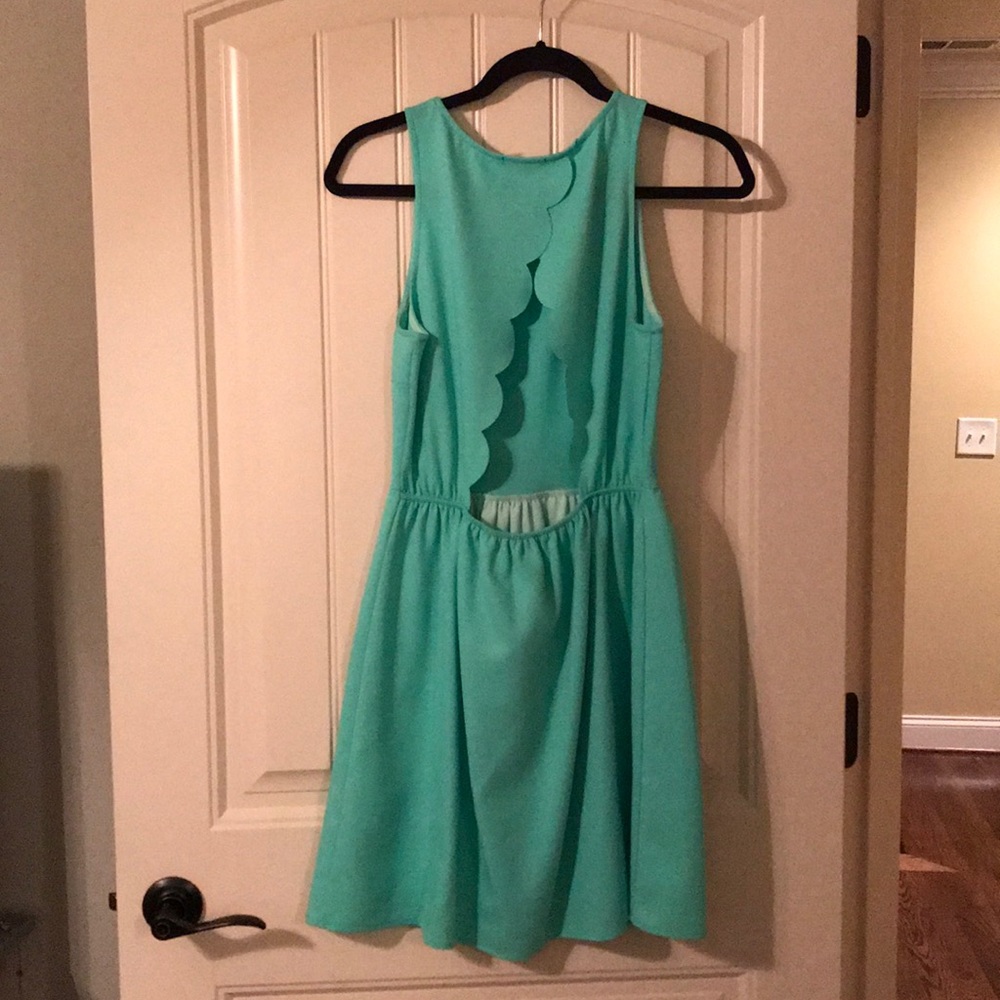 Everly sleeveless dress with scalloped back cutout